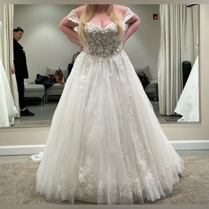 Be the first bride to wear this brand new absolutely beautiful dress by Allure.